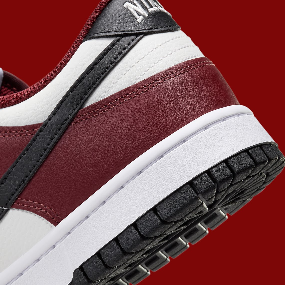 Nike Dunk Low
"Dark Team Red Black"