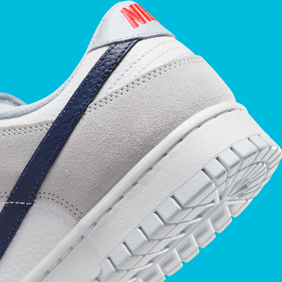 Nike Dunk Low
"White Grey Navy Aqua Mini Swoosh"