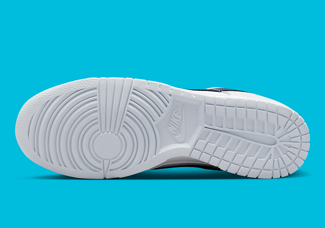 Nike Dunk Low
"White Grey Navy Aqua Mini Swoosh"