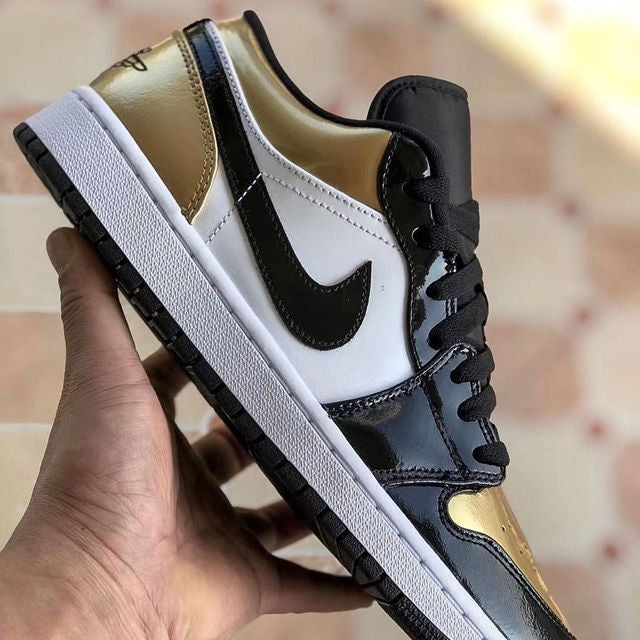 Air Jordan 1 Low
"Gold Toe"