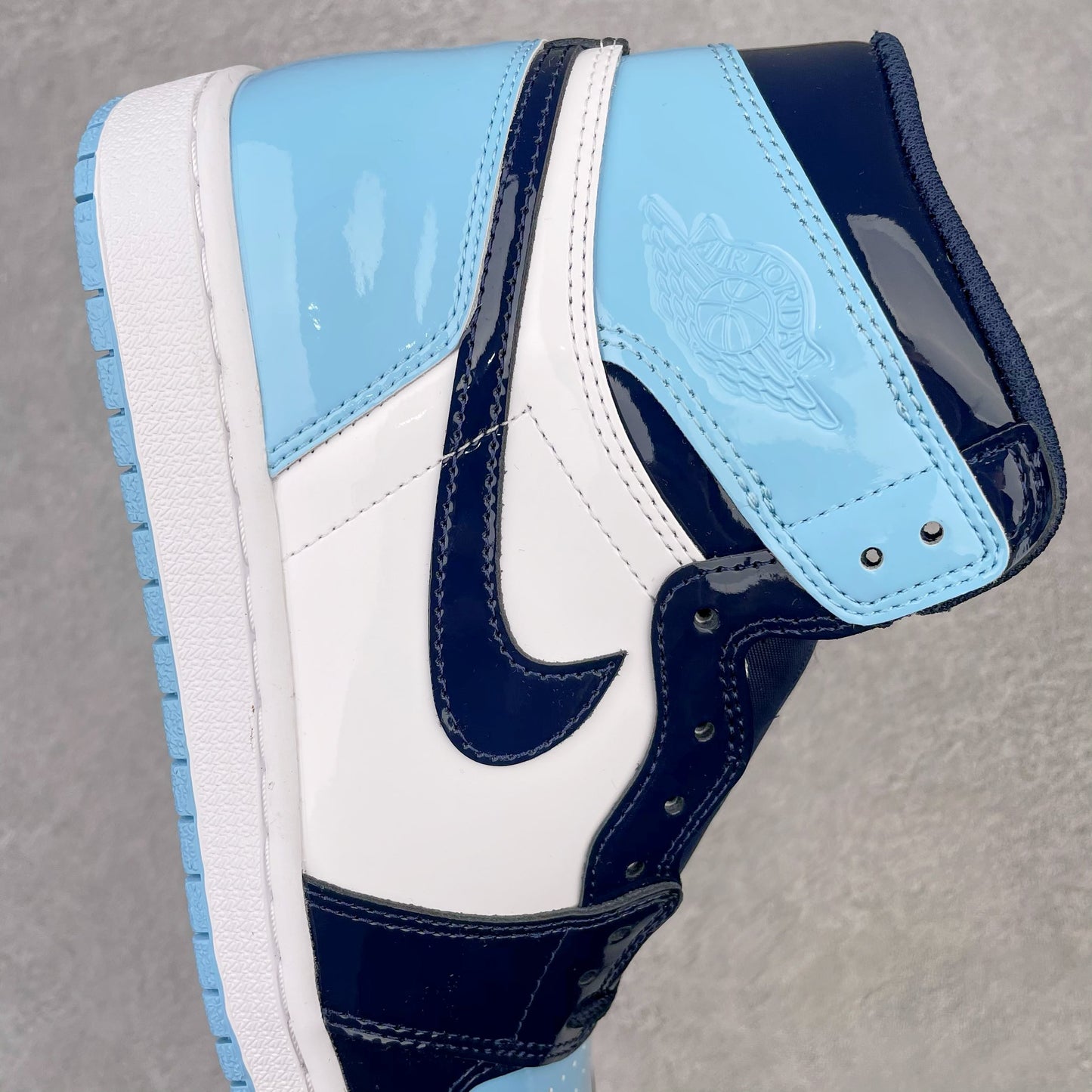 Air Jordan 1 High "UNC Patent Blue Chill"