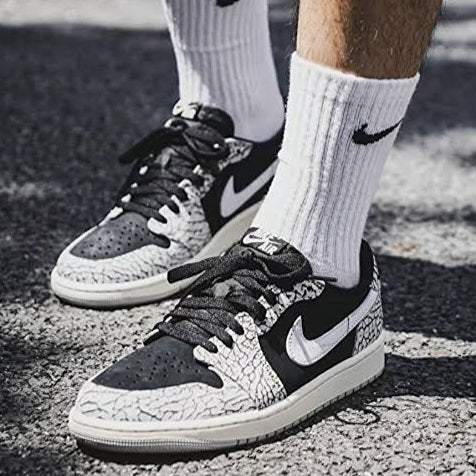 Air Jordan 1 Retro Low OG
"Black Cement"