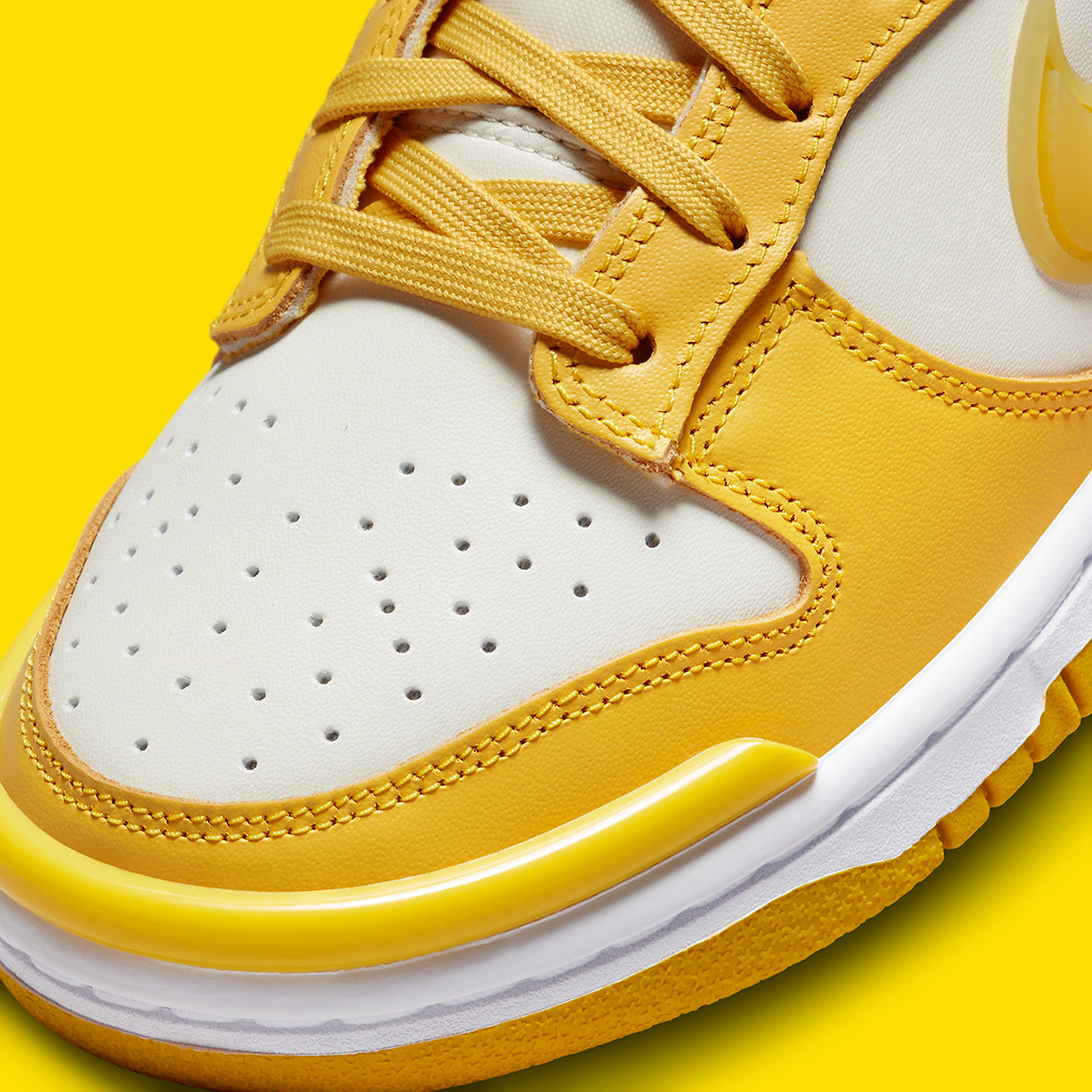 Nike Dunk Low Twist
"Vivid Sulfur" x AMBUSH