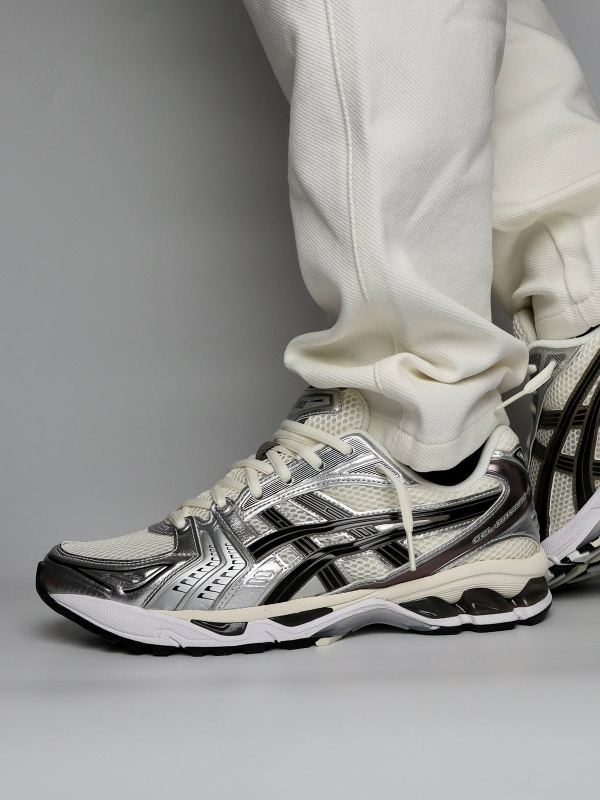 ASICS Gel-Kayano 14
"Cream Black Metallic Plum"