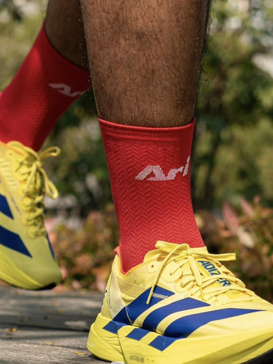 Adidas Adizero Adios Pro 4
"Yellow Navy"