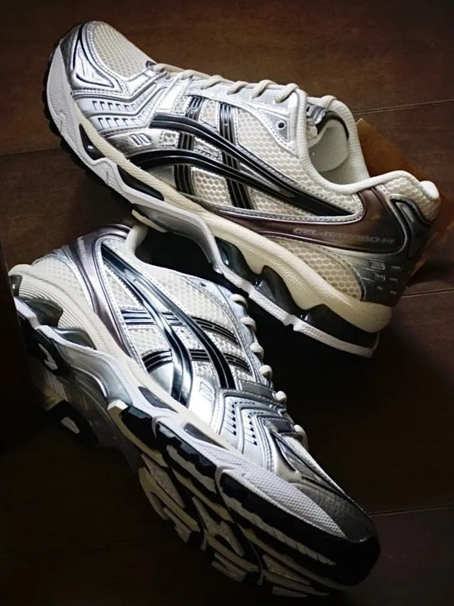 ASICS Gel-Kayano 14
"Cream Black Metallic Plum"